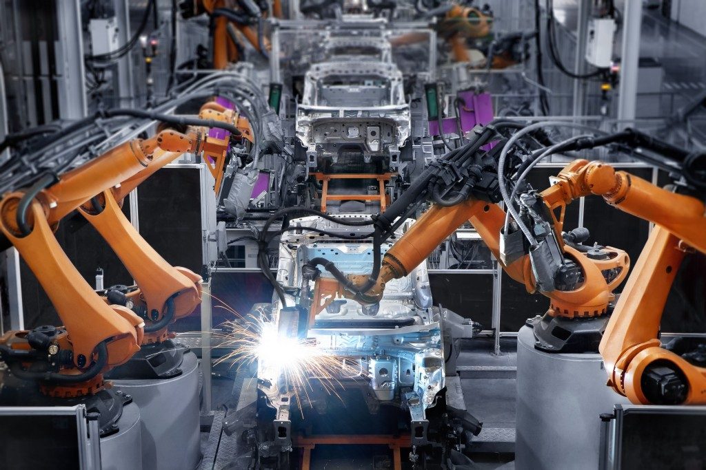 Car manufacturing with robotic hands